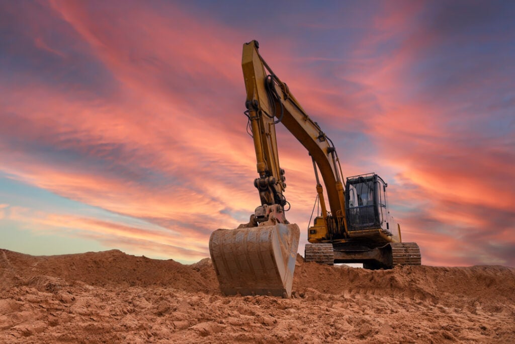 excavator on sunset